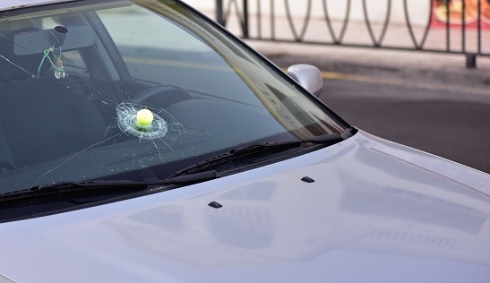 Golf Ball through the window