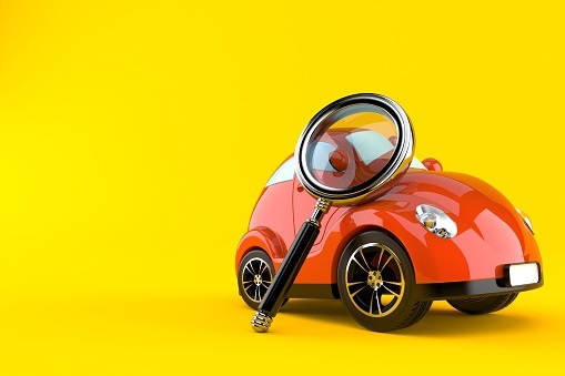Car with magnifying glass