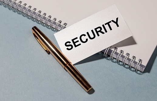 Word writing text Security. Business concept for measures taken to be safe Quality or state of being secure Flat lay above white blank paper with copy space for text messages.